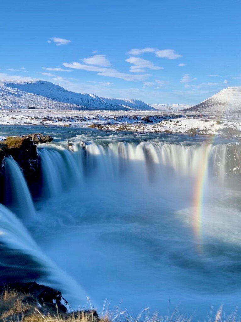 Godafoss waterfall with rainbow