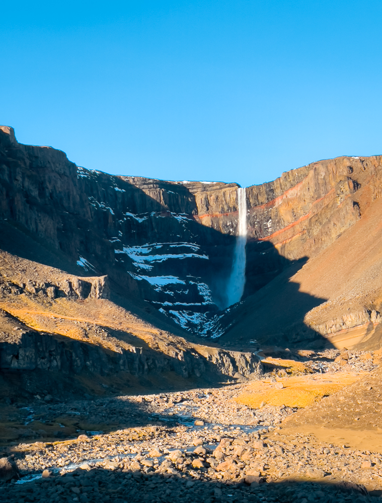 View of Hengifoss red striped waterfall